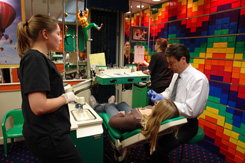 Dr. Cardarelli working with a patient